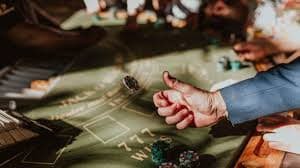 Live blackjack and roulette table interface showing multiple cameras